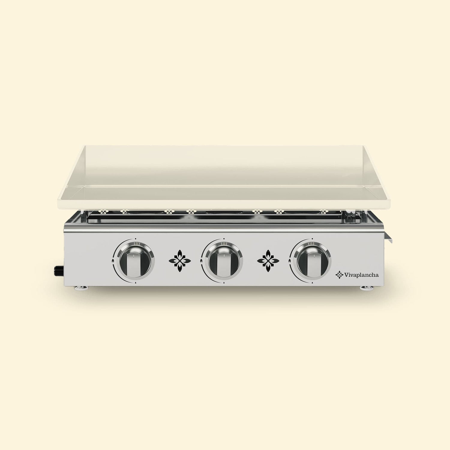 Plancha gaz Vivaplancha 3 brûleurs en inox, avec plaque de cuisson rectangulaire posée sur le châssis, présentée sur fond beige.