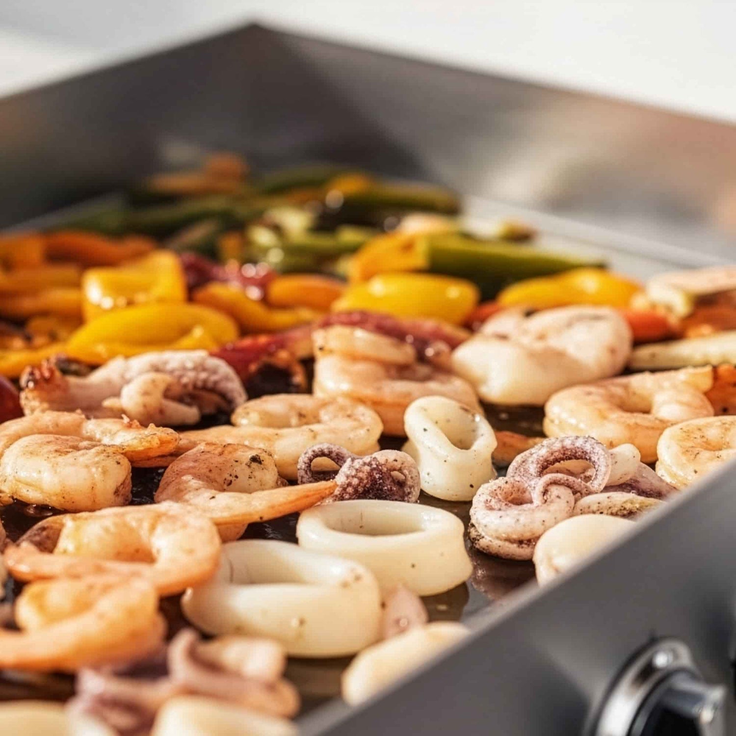 Fruits de mer et légumes cuisinés à la plancha à gaz vivaplancha, cuisson homogène et saisie parfaite